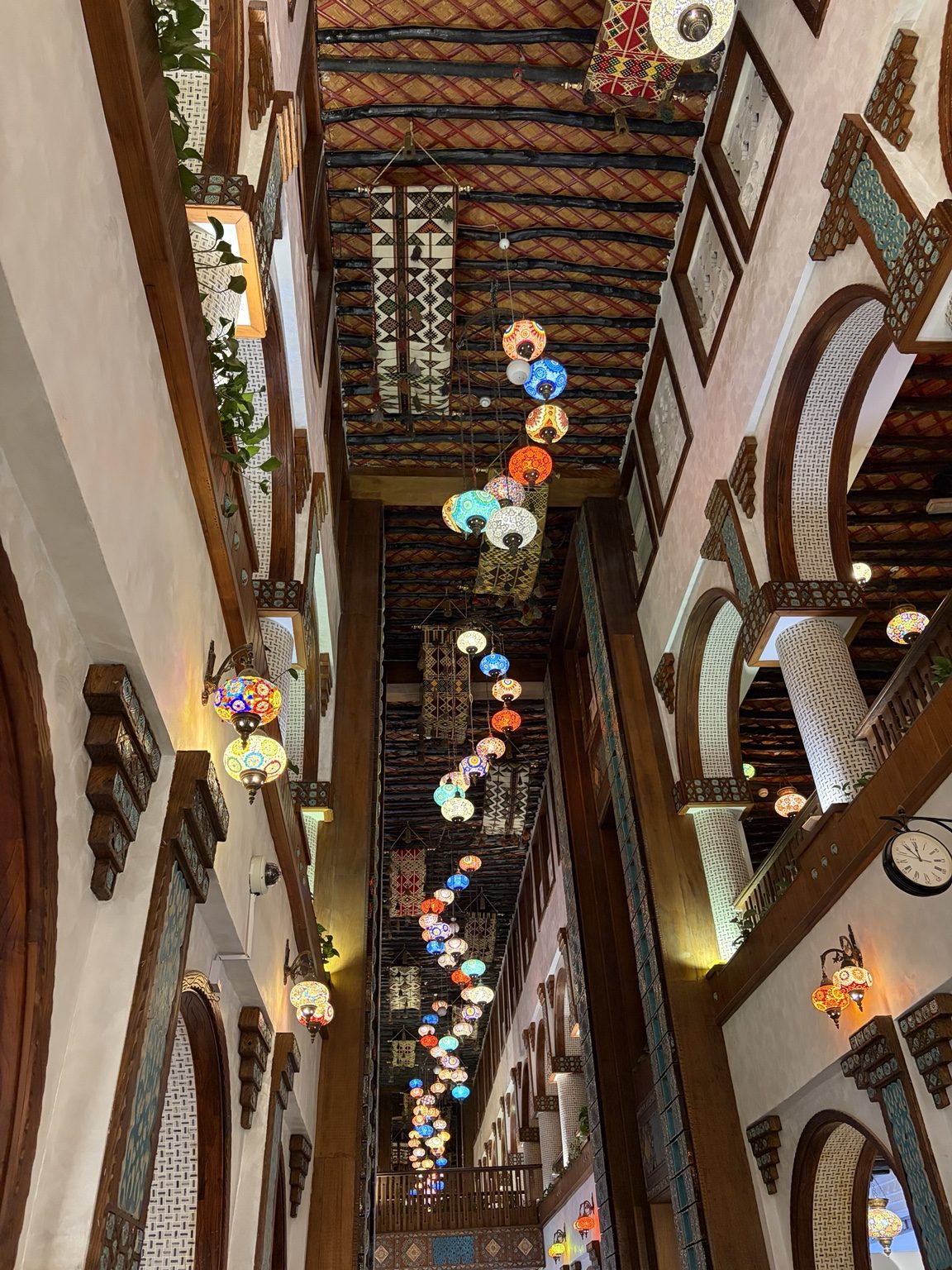 Colourful lanterns along a traditional passage at Souq Waqif
